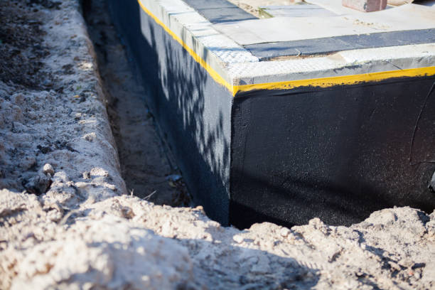 Professional Waterproofing technician working in Wakeman, OH